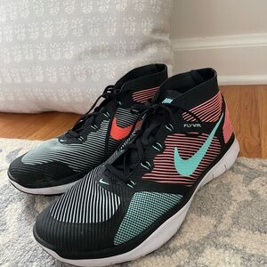 Men’s Nike Free Train Instinct Men's Training Shoe in black, coral, and teal